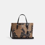 Coach Outlet Mollie Tote Bag 25 In Signature Canvas With Bow Print