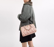 Coach Rowan Satchel Bag
With Rose Print