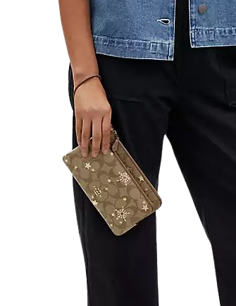 Coach-Double-Zip-Wallet-In-Signature-Canvas-With-Star-And-Snowflake-Print-02.png