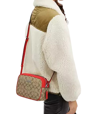 Coach-Jamie-Camera-Bag-In-Signature-Canvas-4-02_ab0b22fa-0a4c-4c6c-b68f-925a102f27e2.png