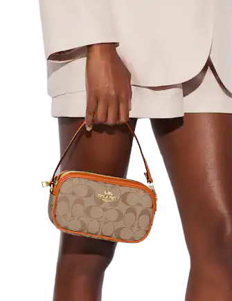 Coach-Jamie-Wristlet-In-Signature-Canvas-4-02.png