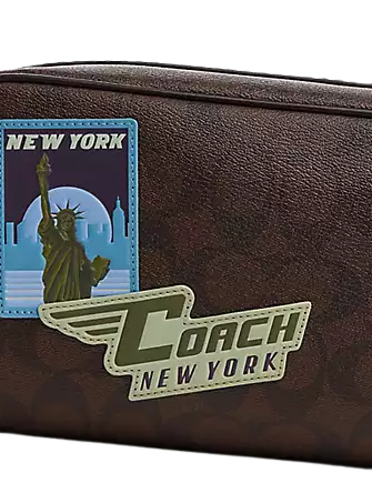 Coach-Large-Travel-Kit-In-Signature-Canvas-With-Travel-Patches-2-02.png