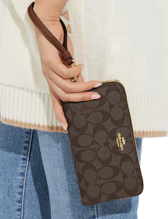 Coach-Long-Zip-Around-Wallet-In-Signature-Canvas-3-02_c67a3303-812a-4813-9e5d-a272cd043e49.png