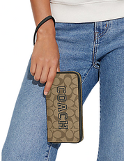 Coach Long Zip Around Wallet In Signature Canvas With Varsity Motif