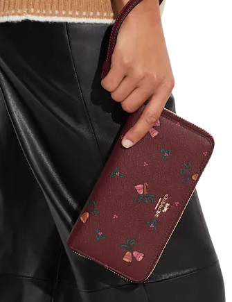 Coach-Long-Zip-Around-Wallet-With-Holiday-Bells-Print-3-02.png