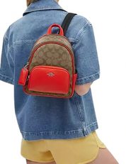 Coach Mini Court Backpack In Signature Canvas