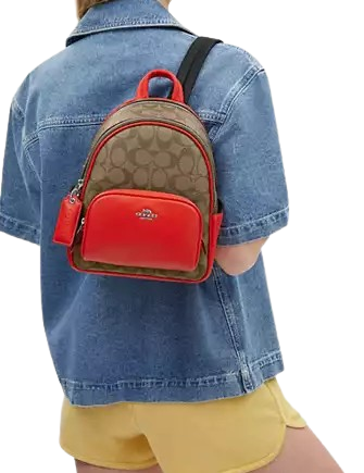 Coach-Mini-Court-Backpack-In-Signature-Canvas-4-02_d4a4fd40-b13a-4785-bb9c-9da45ee72377.png