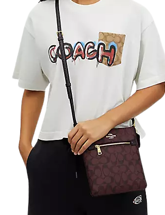 Coach-Mini-Rowan-File-Bag-In-Signature-Can-v4-02.png