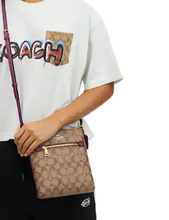 Coach-Mini-Rowan-File-Bag-In-Signature-Canvas-7-02.png