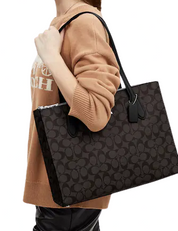 Coach Nina Carryall In Signature Canvas