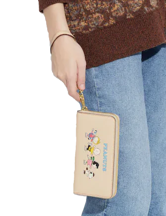 Coach-X-Peanuts-Long-Zip-Around-Wallet-With-Snoopy-And-Friends-Motif-3-02.png