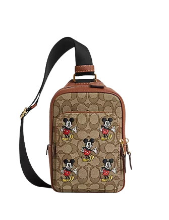 Disney-X-Coach-Track-Pack-14-In-Signature-Jacquard-With-Mickey-Mouse-Print-4-01_68df5160-f37c-4160-9acf-783d1f13aa20.png