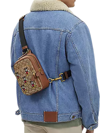 Disney-X-Coach-Track-Pack-14-In-Signature-Jacquard-With-Mickey-Mouse-Print-4-02_5eb39a90-78a0-497a-9240-f71d0d5e159a.png