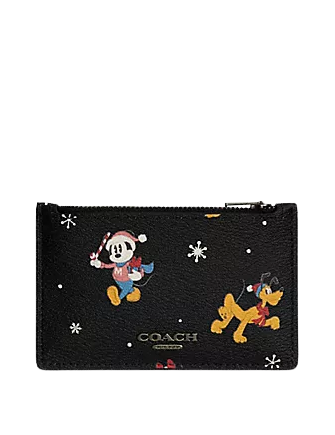 Disney-X-Coach-Zip-Card-Case-With-Holiday-Print-01_422e2c4b-623a-4d30-b05f-768adbfa94db.png