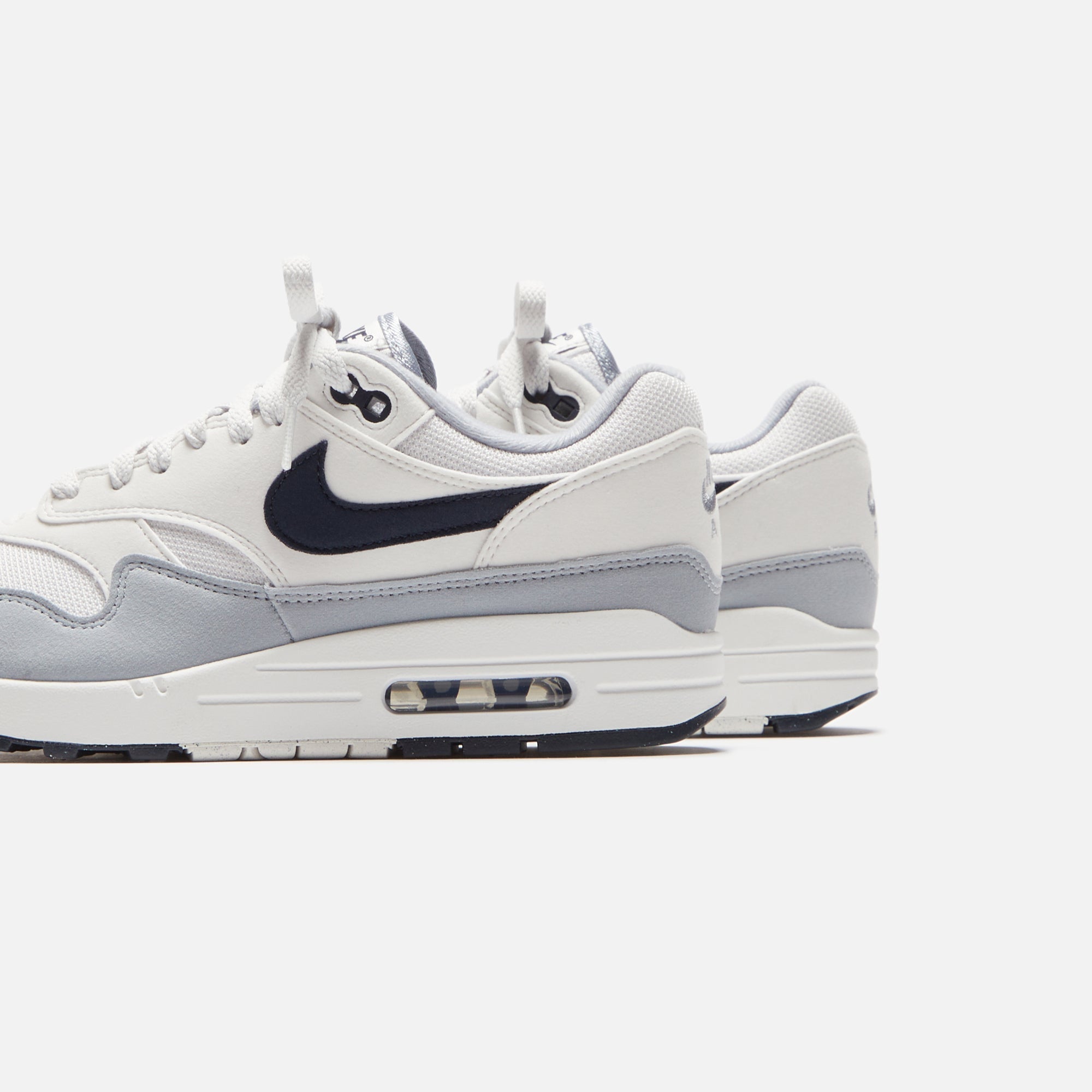 Nike Air Max 1 - Platinum Tint / Wolf Grey / Dark Obsidian