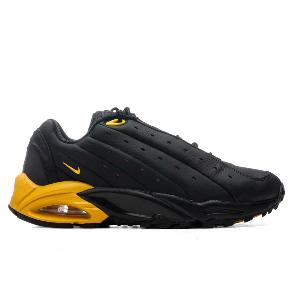 Nike-NOCTA-Hot-Step-Air-Terra---Black-University-Gold-DH4692-002---07-03-22---Feature-JORDAN-VR.jpg