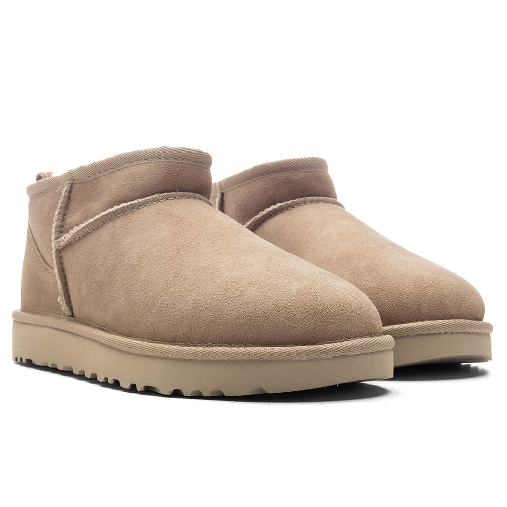 Women_s-Classic-Ultra-Mini-Boot---Sand-1116109-SAN-09-09-24-Feature-KN-4.jpg