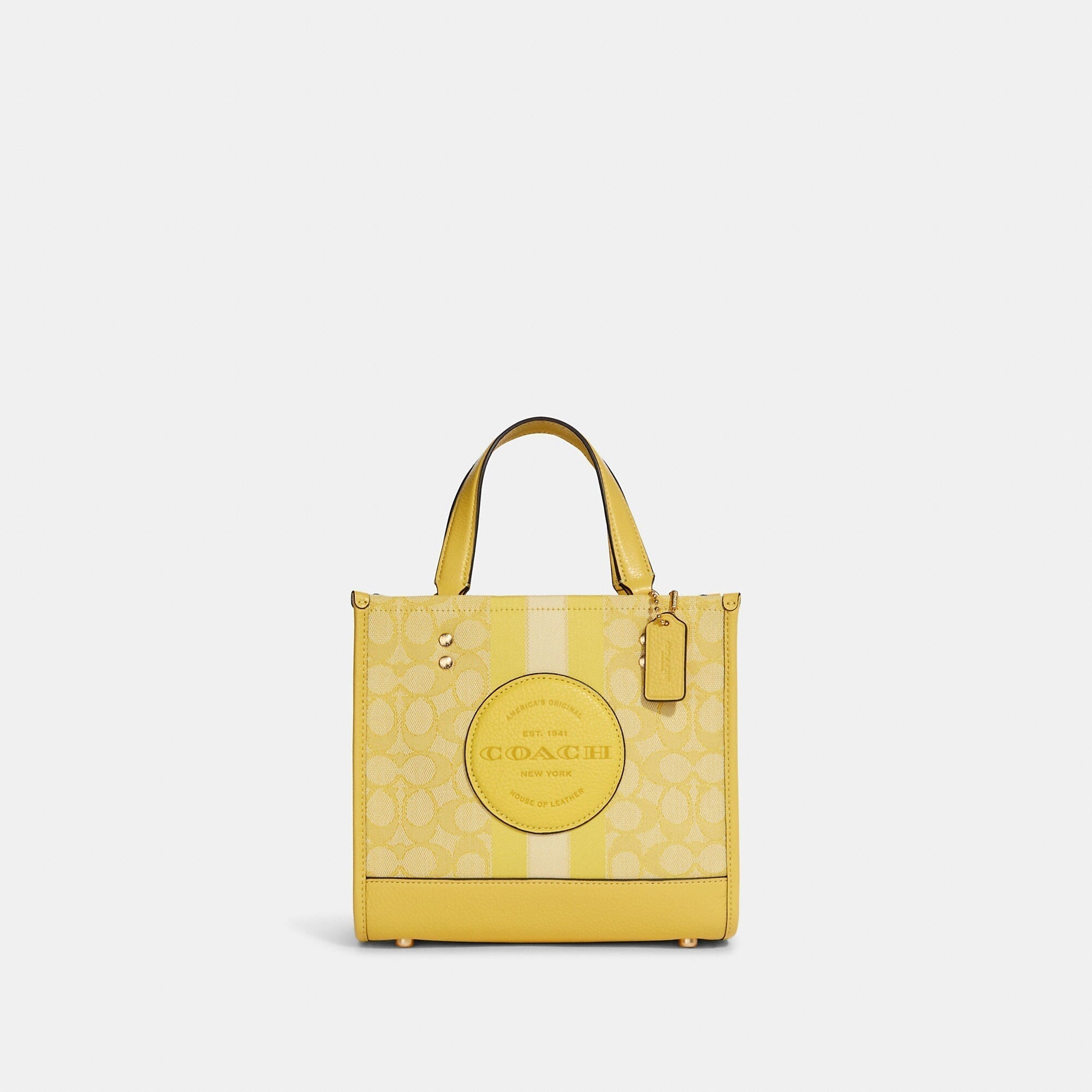 Coach Outlet Dempsey Tote 22 In Signature Jacquard With Stripe And Coach Patch