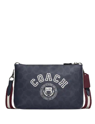 coach-everett-crossbody-in-signature-canvas-with-varsity-motif.png