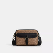 Coach Outlet Warner Crossbody Bag In Signature Canvas