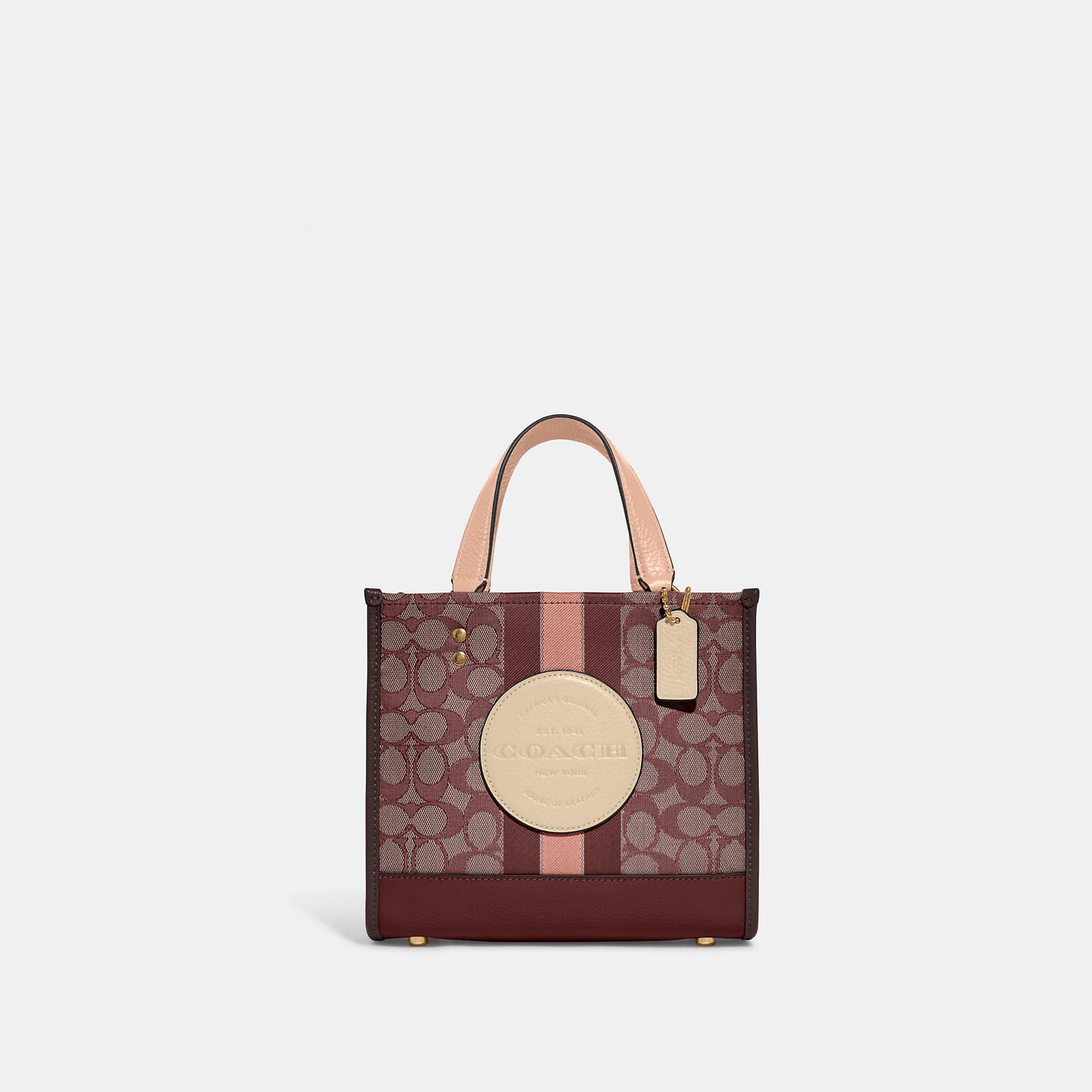 Coach Outlet Dempsey Tote 22 In Signature Jacquard With Stripe And Coach Patch